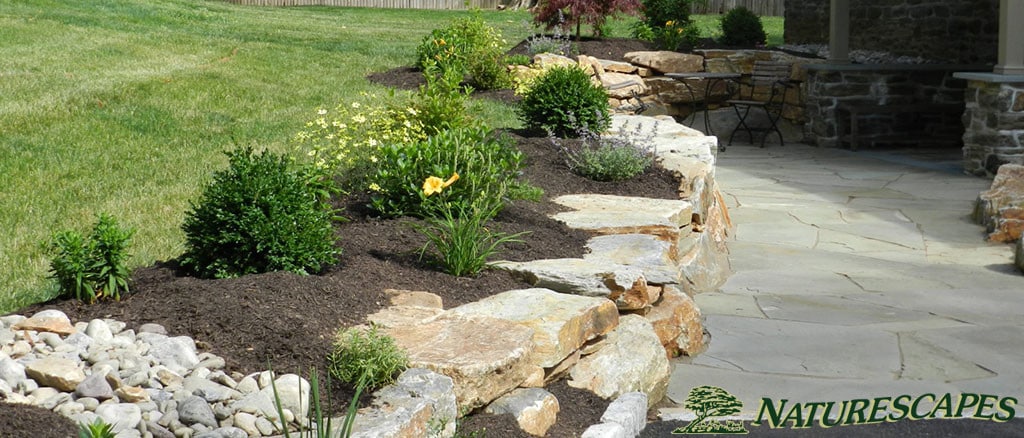 boulder walls and landscape for water mitigation