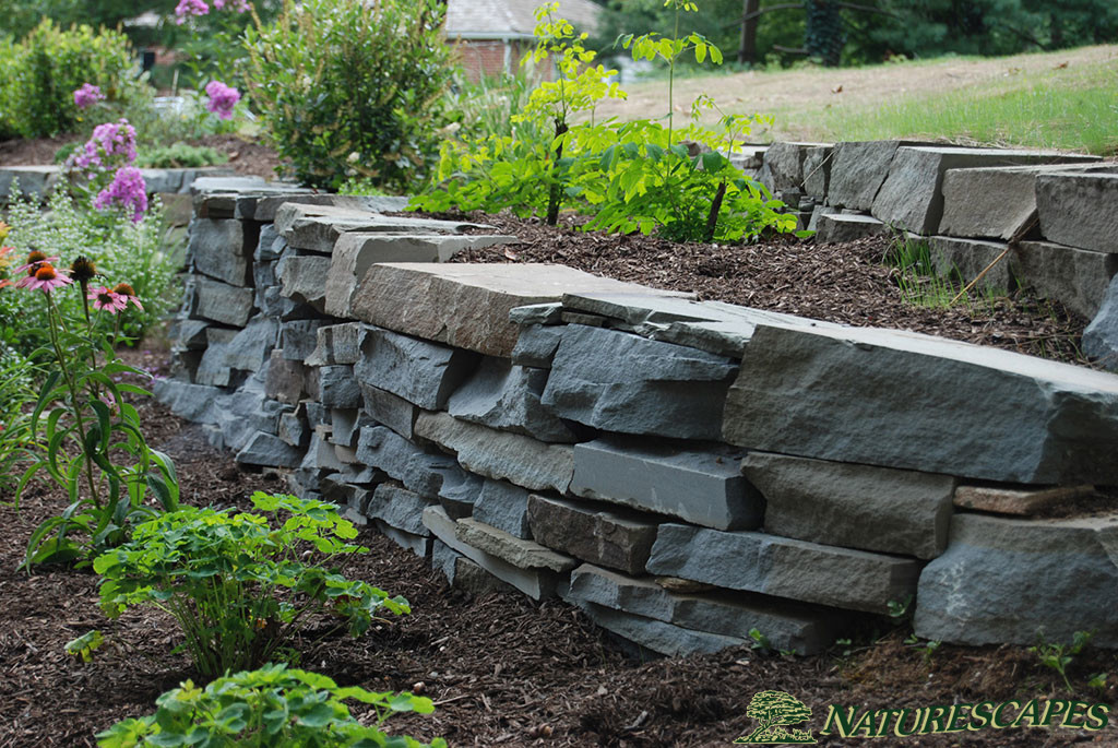 Natural Stone Retaining Walls Naturescapes Landscape Specialists - Natural Stone Retaining Wall Ideas