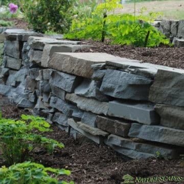 Stone Retaining wall for water mitigation in Wayne